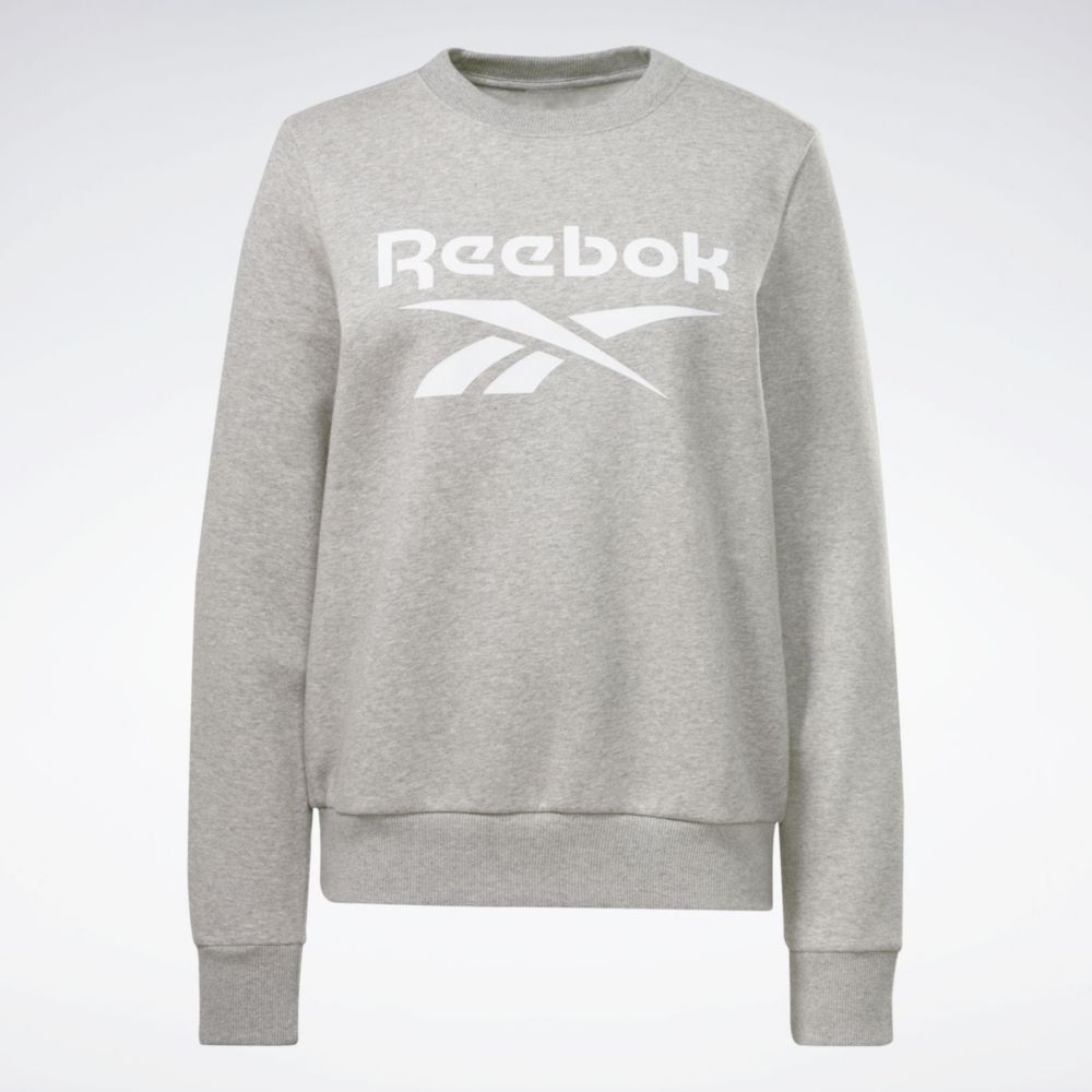 Poleron mujer online reebok