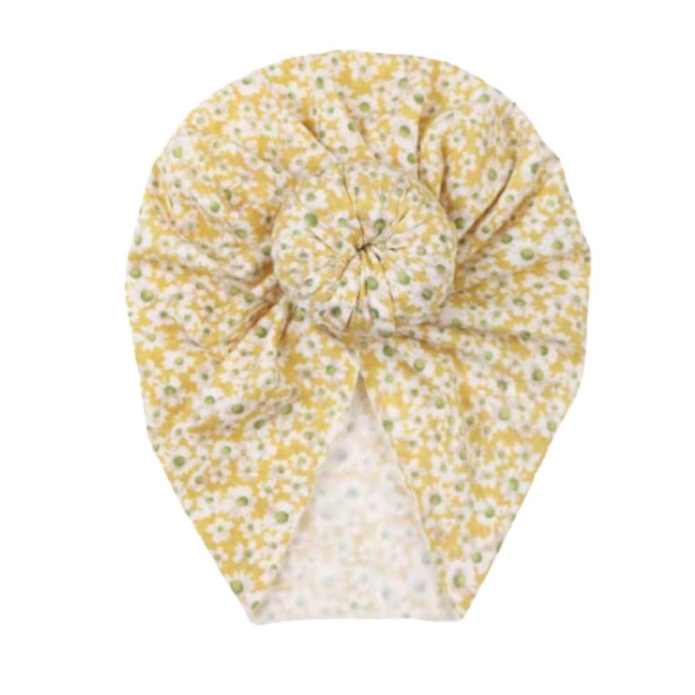 Turbante Lucaland moño flores amarillas