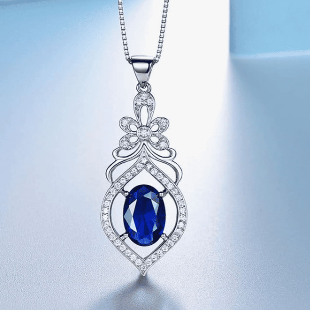 COLLAR FLOR IMPERIAL CON CIRCONIA AZUL - PLATA 925