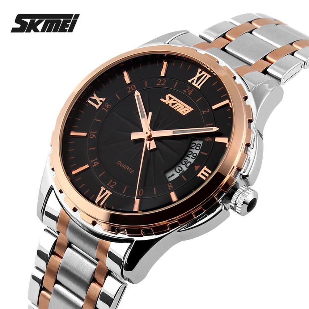 Reloj Skmei 9069 Plateado detalles oro rosa fondo negro