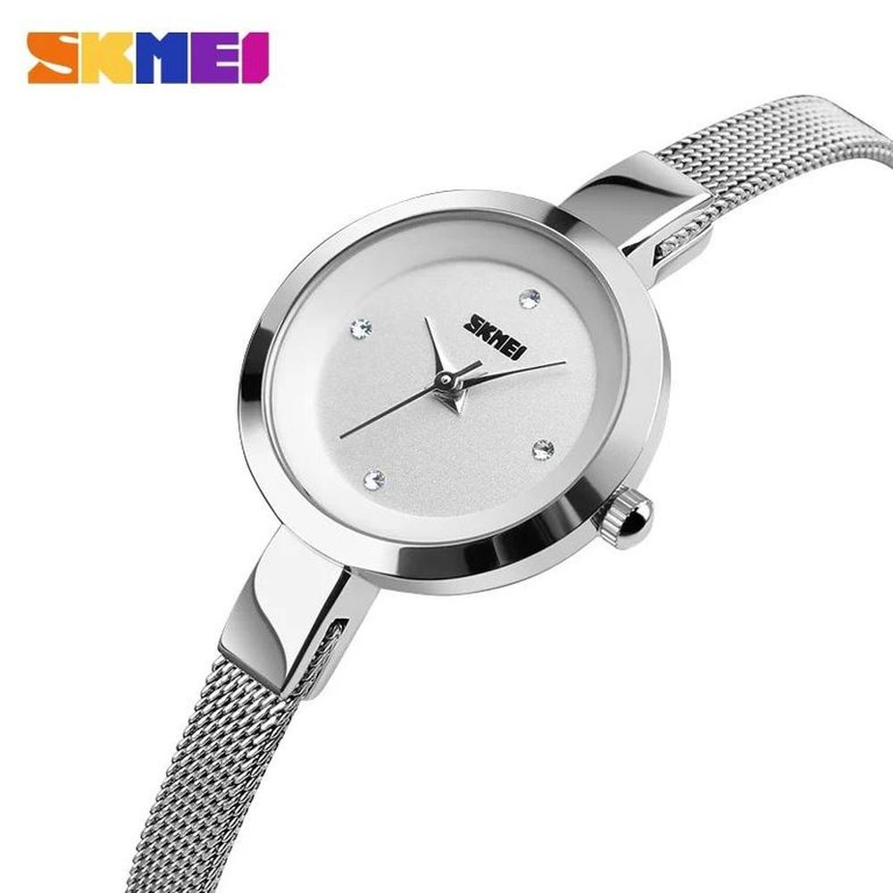 RELOJ SKMEI 1390 PLATEADO CORREA ACERO PARA MUJER.