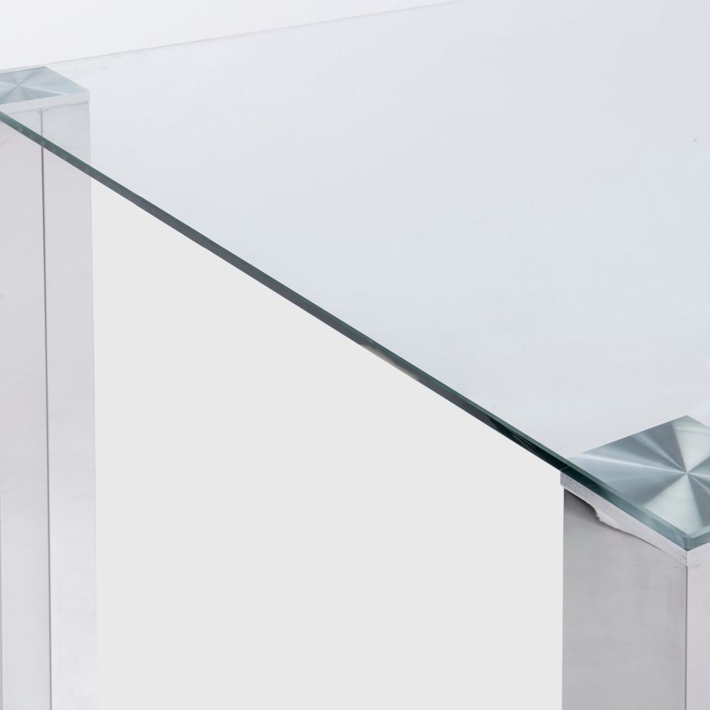 Mesa de comedor realizada en acero inoxidable y cristal templado.  Disponible en tres medidas