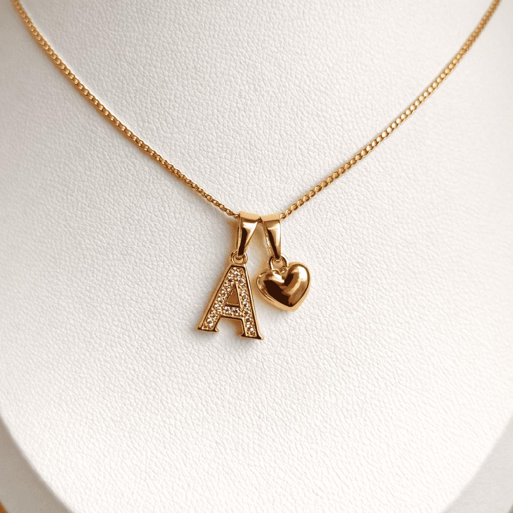 COLLAR LETRA A Y CORAZON BAÑADO EN ORO ROSA 18 KILATES