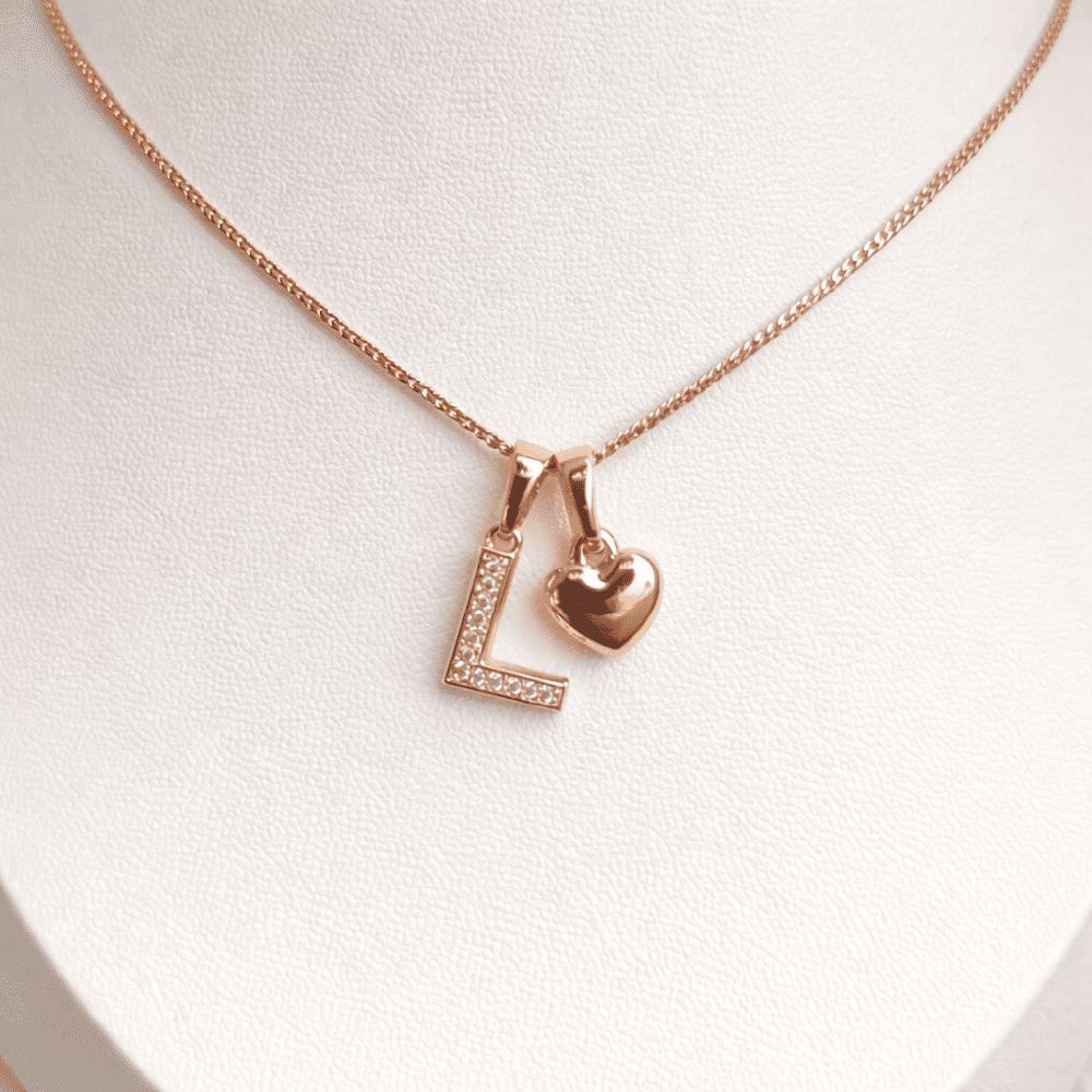 COLLAR LETRA L Y CORAZON BAÑADO EN ORO ROSA 18 KILATES