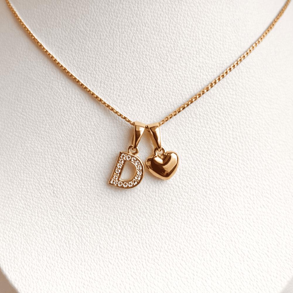 COLLAR LETRA D Y CORAZON BAÑADO EN ORO ROSA 18 KILATES