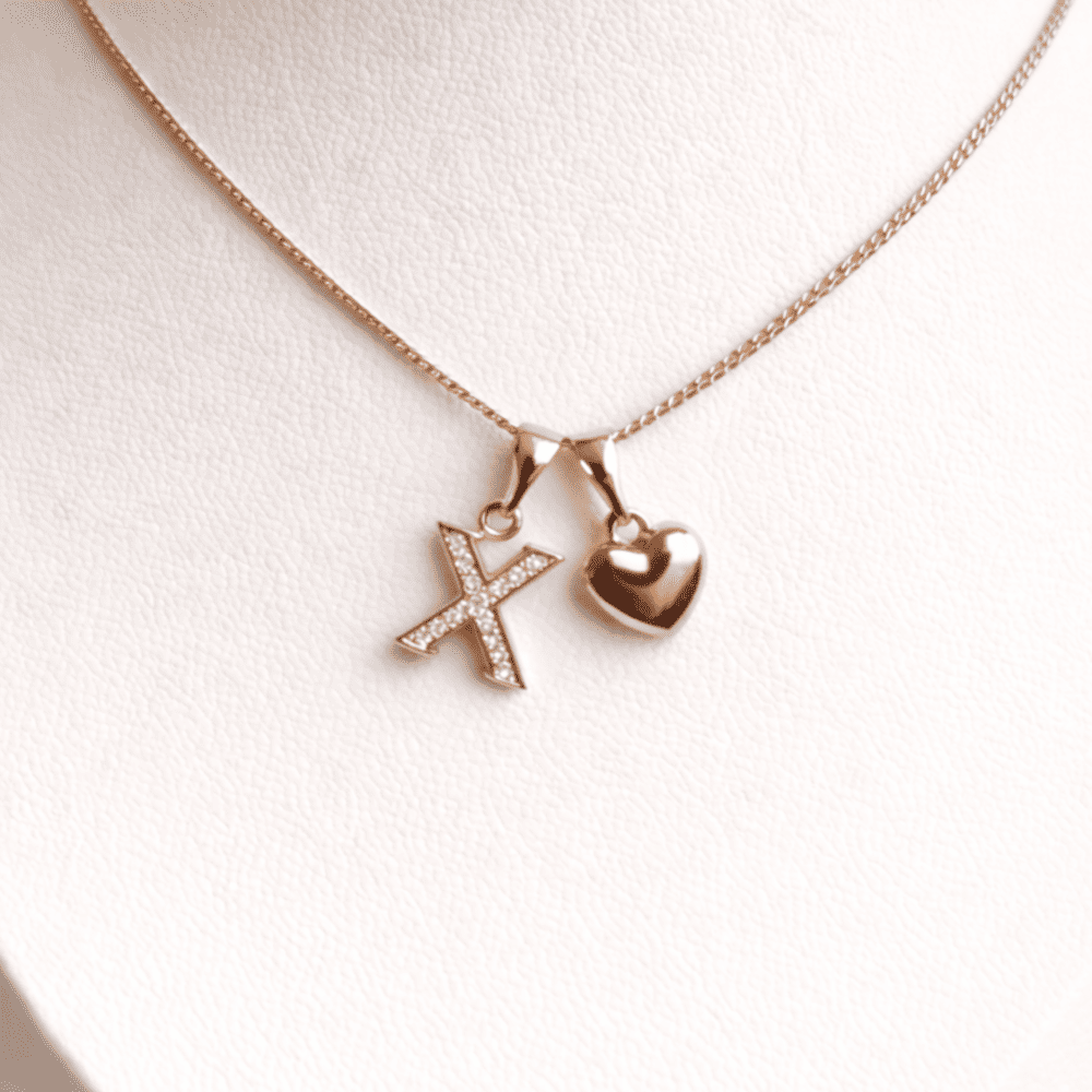 COLLAR LETRA X Y CORAZON BAÑADO EN ORO ROSA 18 KILATES