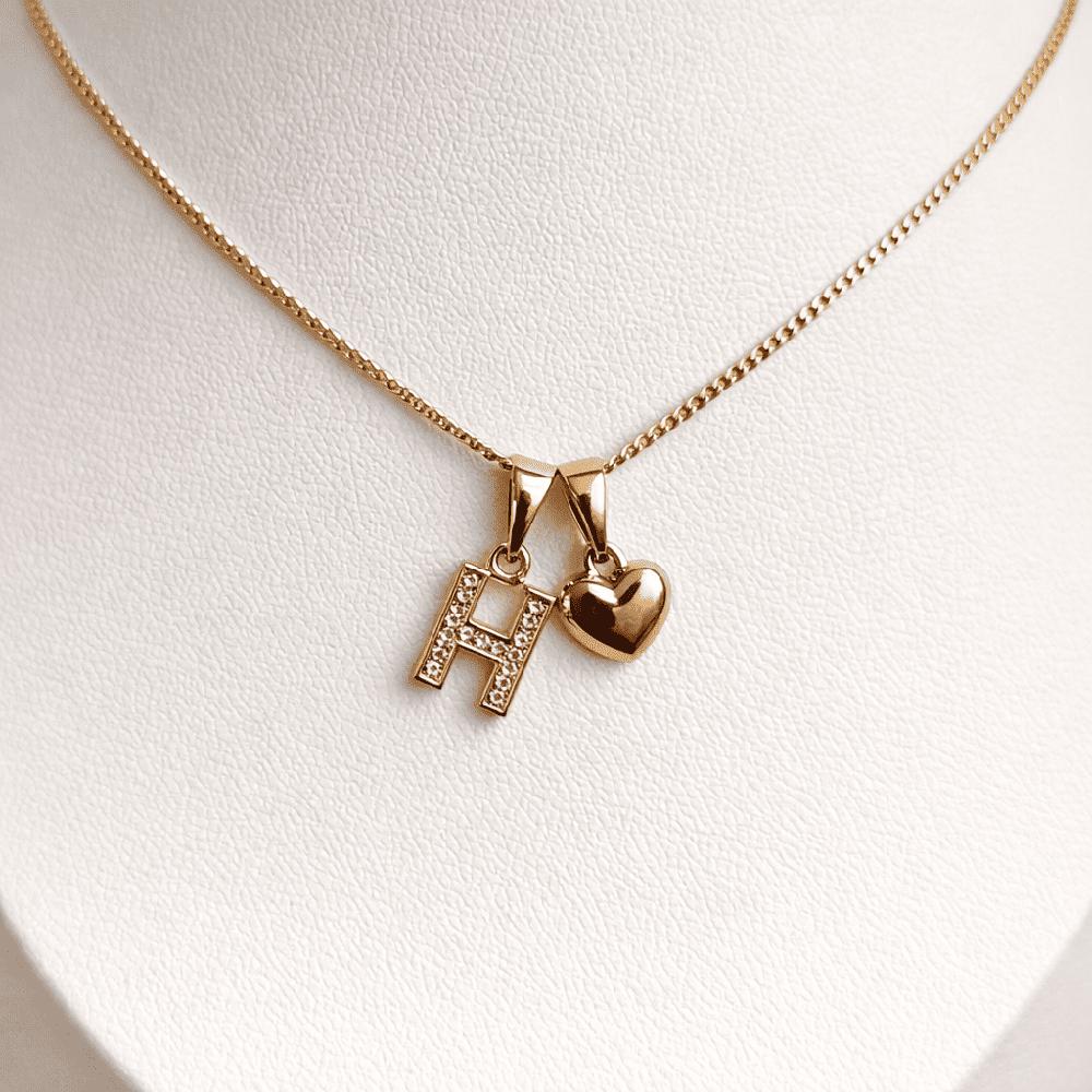 COLLAR LETRA H Y CORAZON BAÑADO EN ORO ROSA 18 KILATES