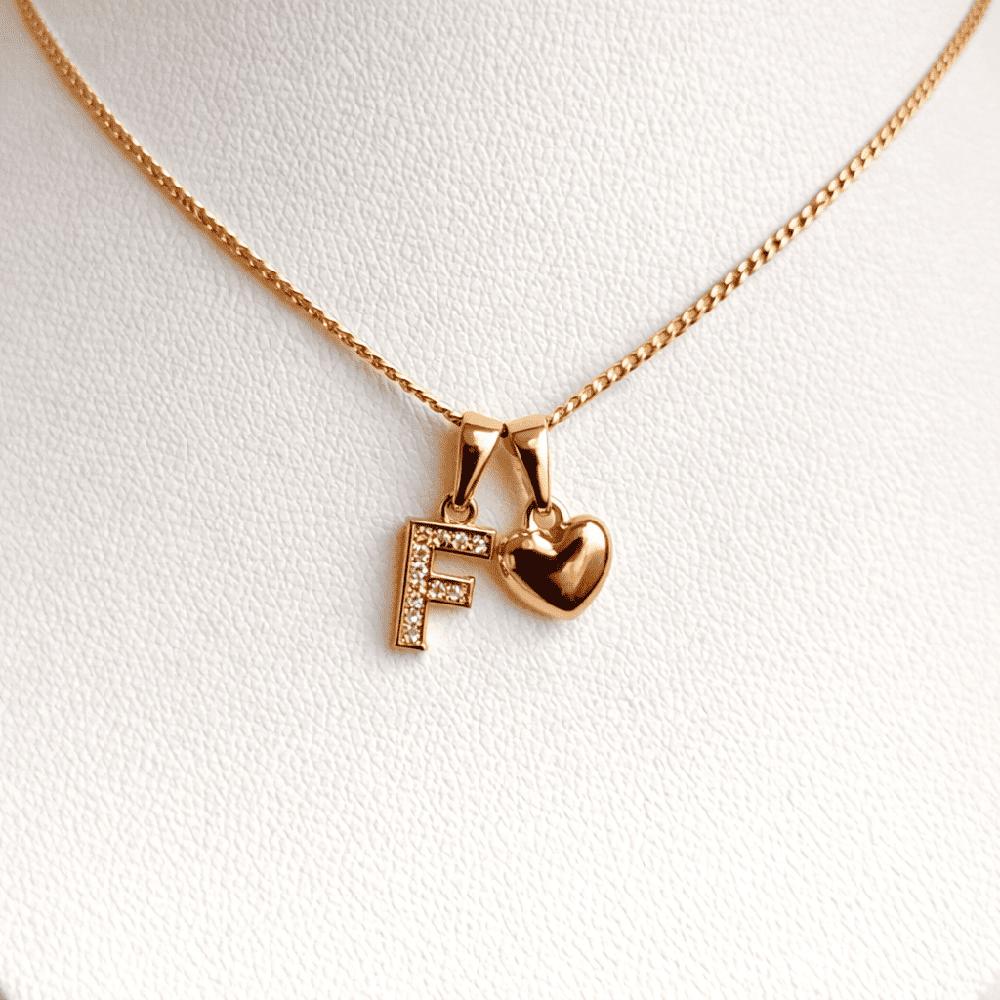 COLLAR LETRA F Y CORAZON BAÑADO EN ORO ROSA 18 KILATES