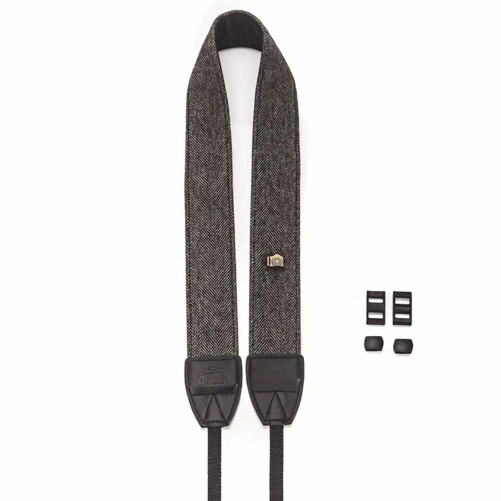 Correa gris con dije para cámara