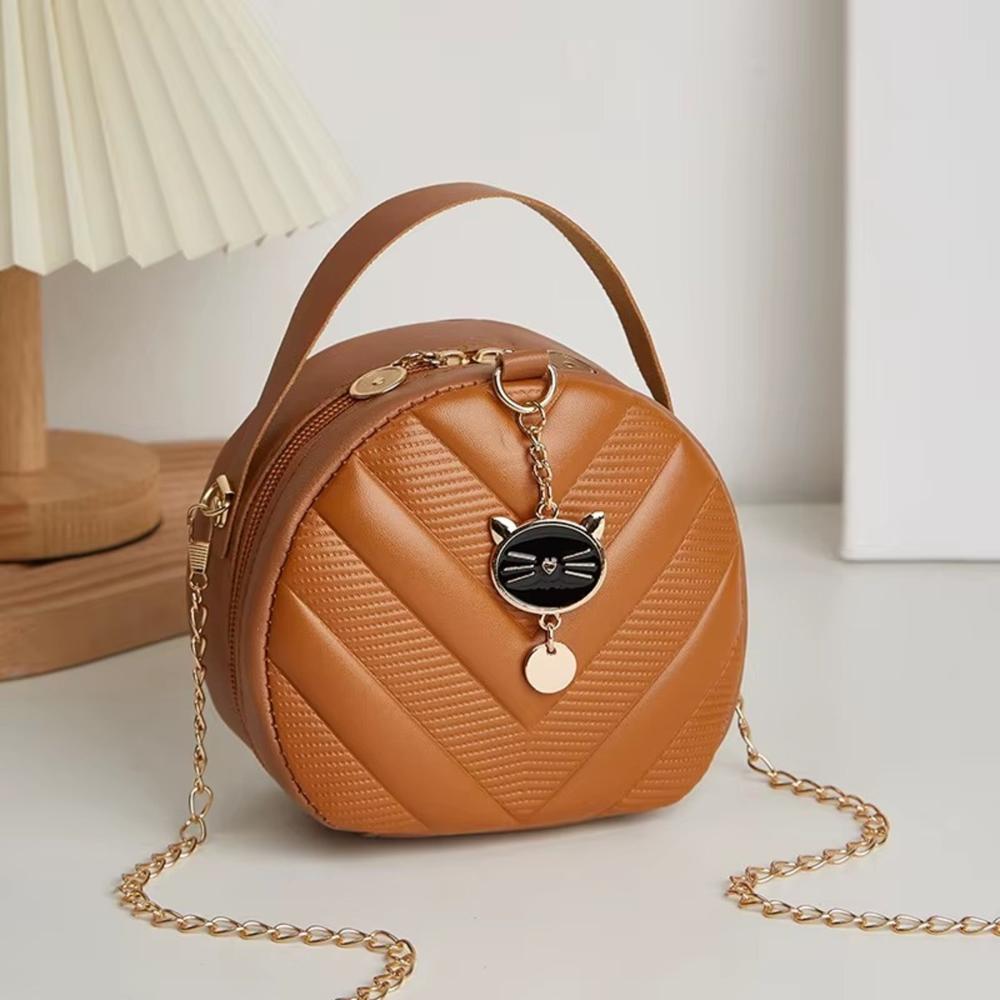 CARTERA MINI ROUND MARRON 12X6X15CM